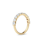 Alliansering gult gull 1,00 ct – sett fra siden med halv diamantrekke