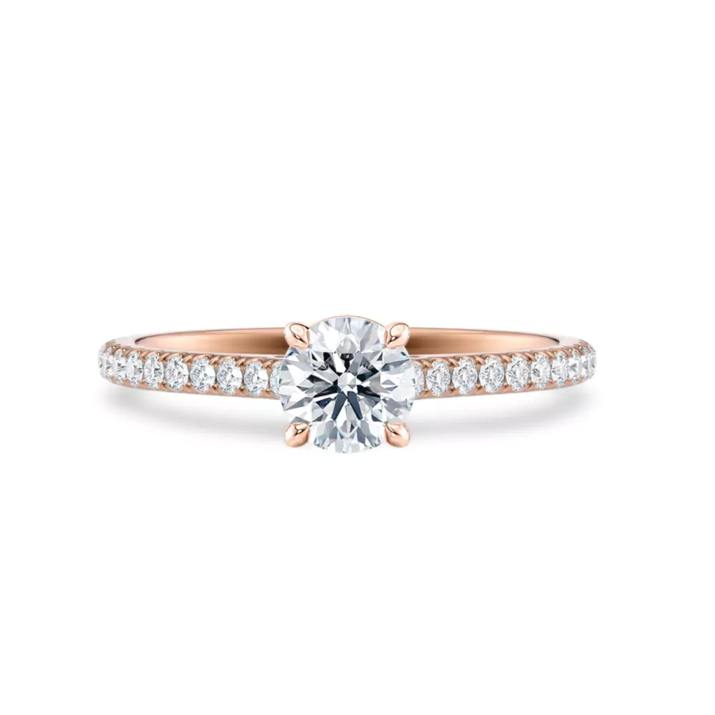 Tynn diamantring pavé roségul 0,76 ct med lab-diamant, vist liggende forfra, designet av Hartwell.