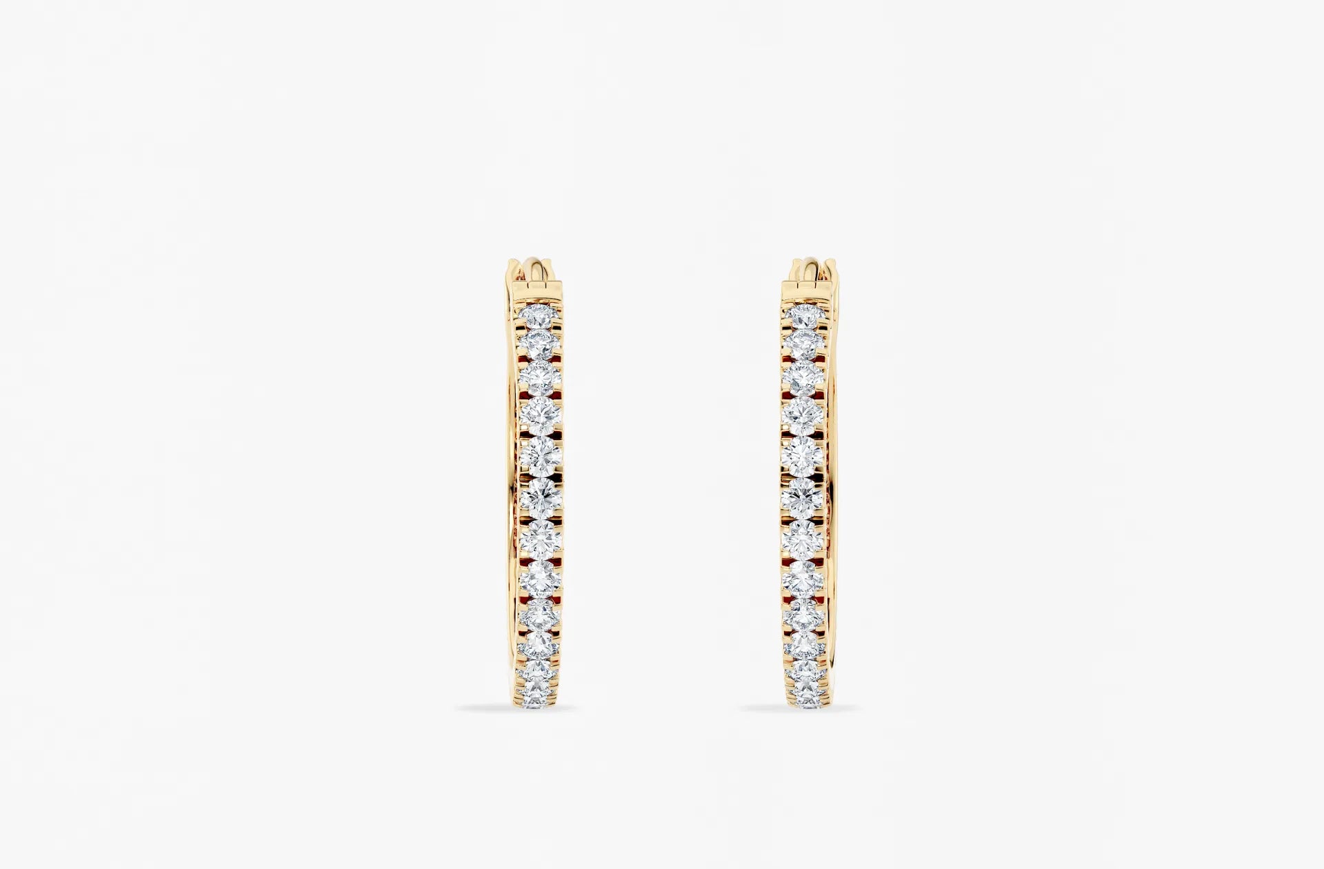Elegante øreringer med diamanter i gull fra Hartwell