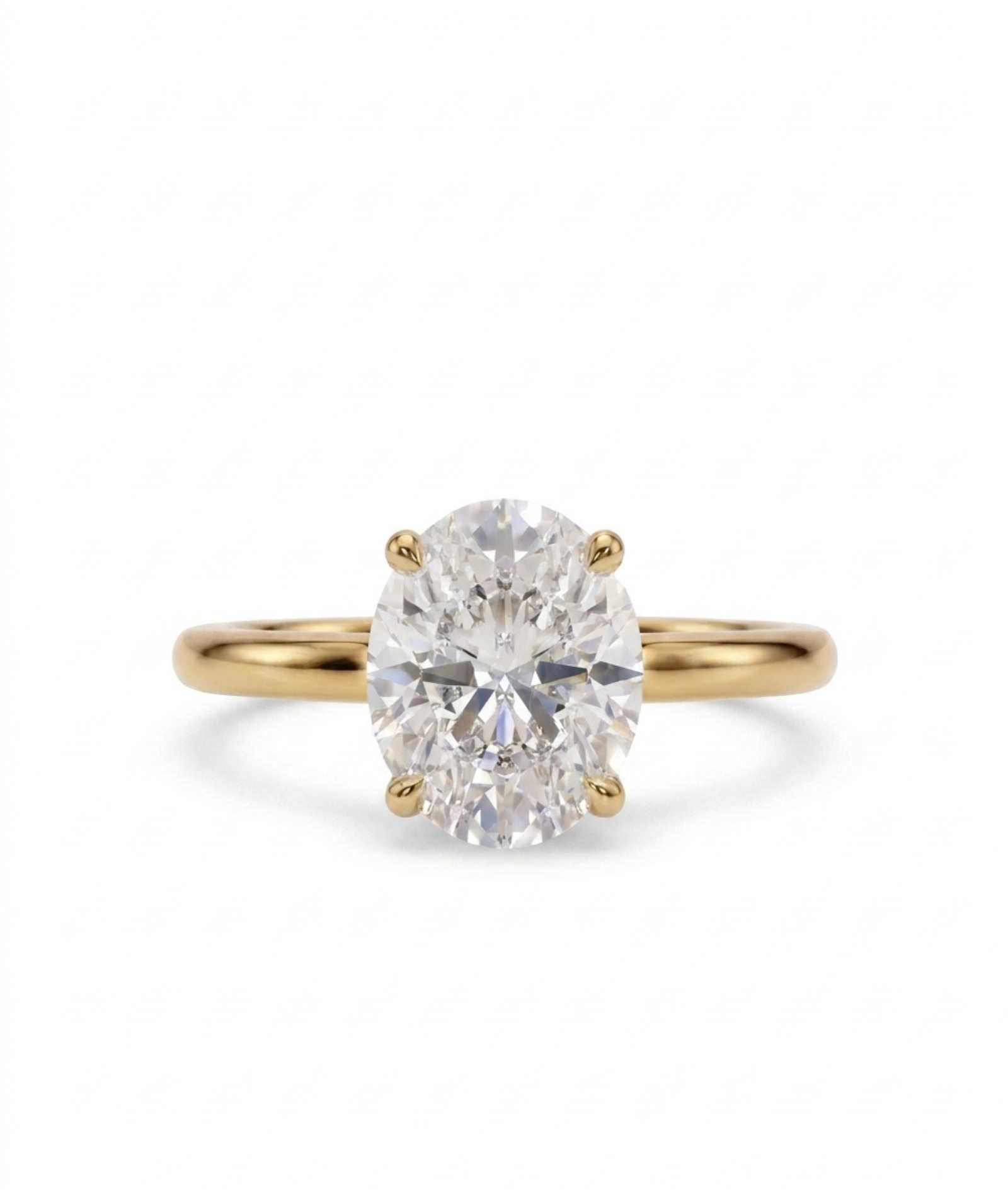 Diamantring oval gult gull 2 ct lab diamant, vist liggende forfra, designet av Hartwell.