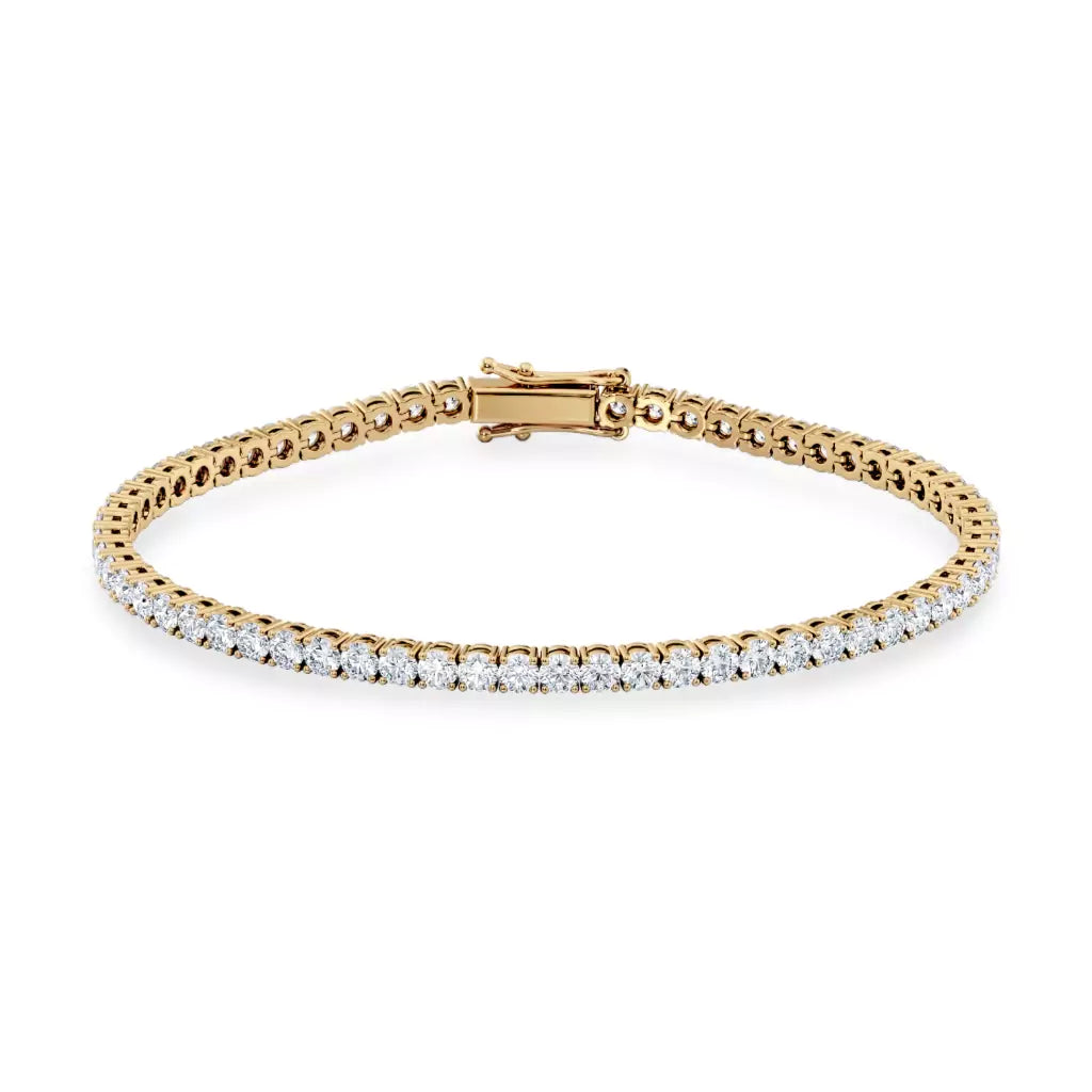 Tennisarmbånd i gult gull med 5 carat diamanter hvis liggene forfra 