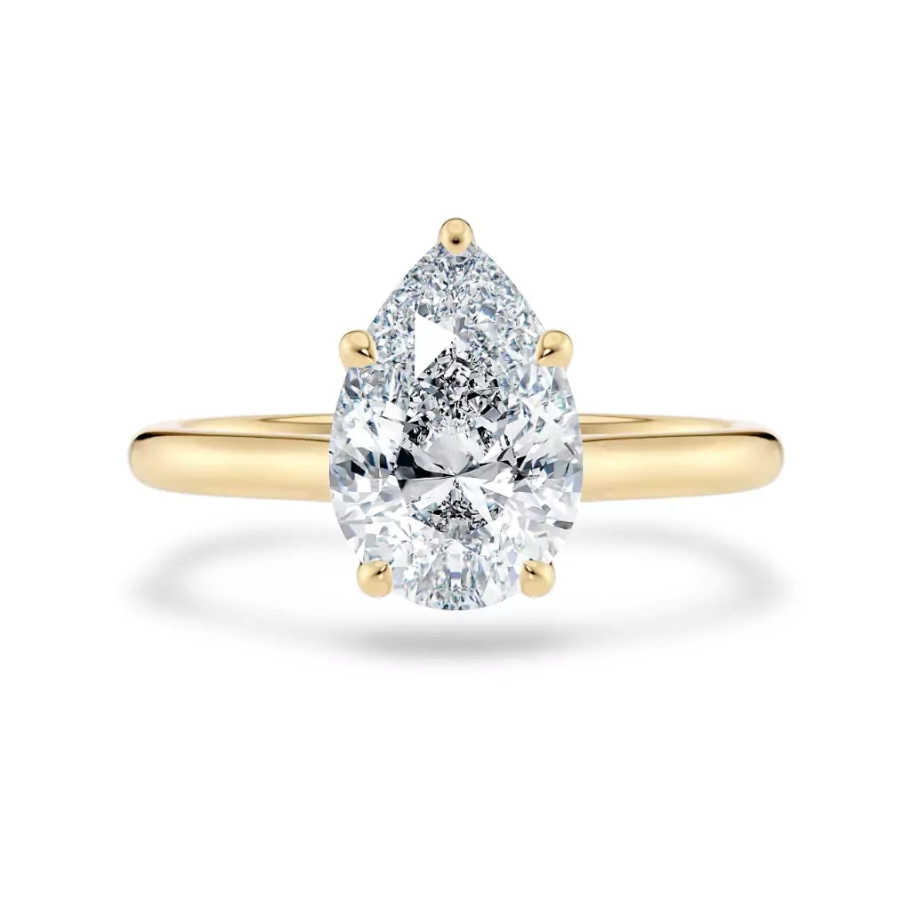 Diamantring dråpe gult gull 2 ct lab diamant, vist liggende forfra, designet av Hartwell.