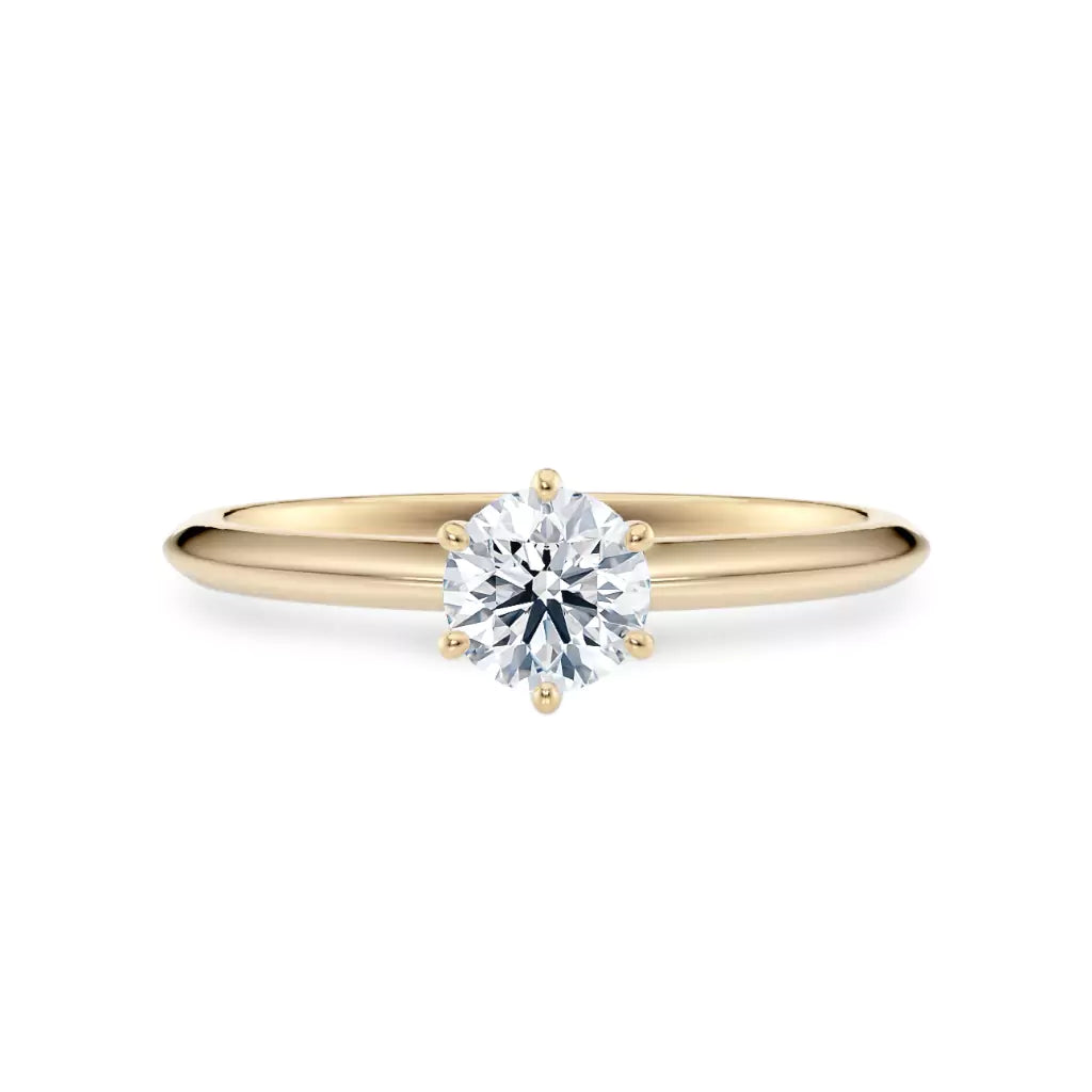 Diamantring i gult gull med 0,50 ct lab-diamant i knife edge design, vist liggende forfra, designet av Hartwell.