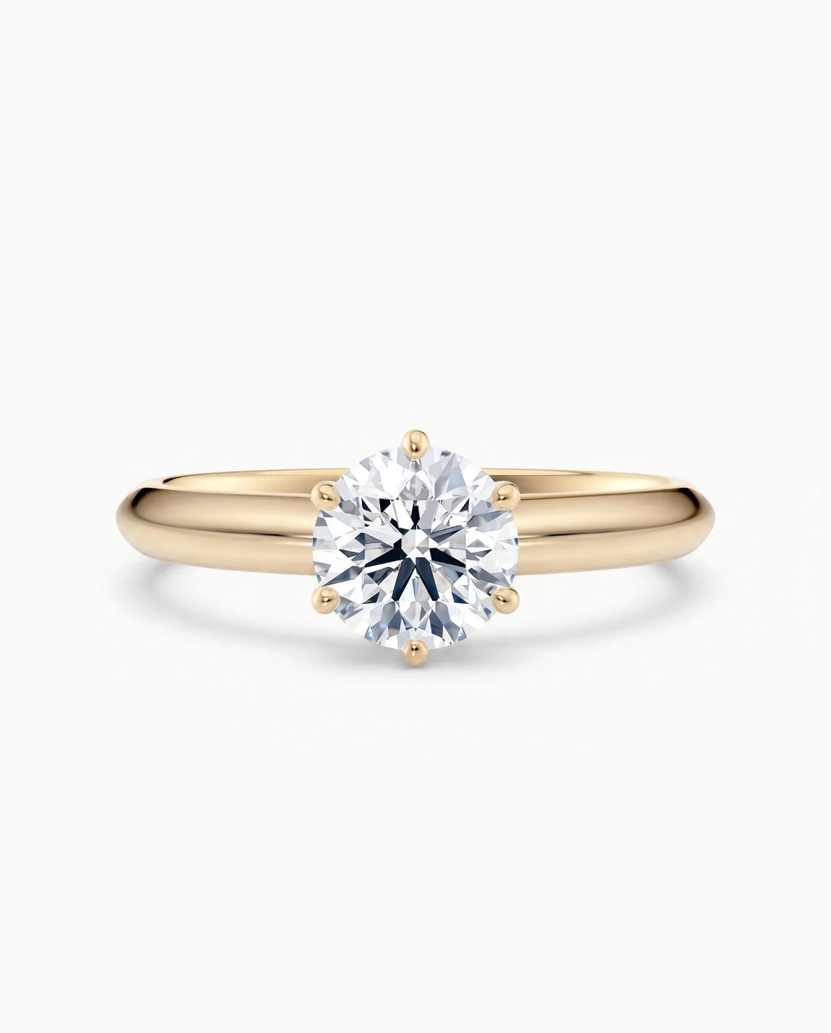 Diamantring i gult gull med 1,00 ct lab-diamant i knife edge design, vist liggende forfra, designet av Hartwell.