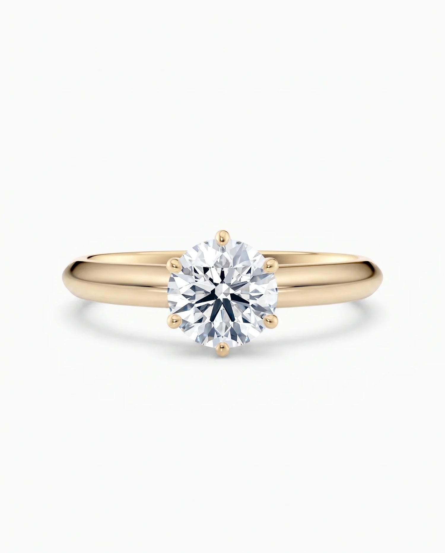 Diamantring i gult gull med 1,00 ct lab-diamant i knife edge design, vist liggende forfra, designet av Hartwell.