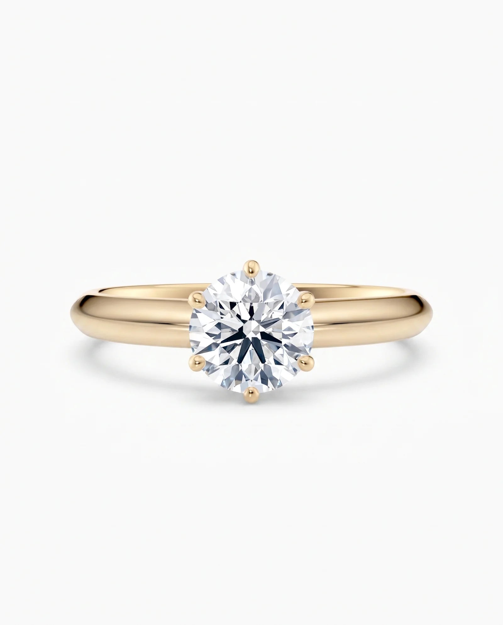 Diamantring i gult gull med 1,00 ct lab-diamant i knife edge design, vist liggende forfra, designet av Hartwell.