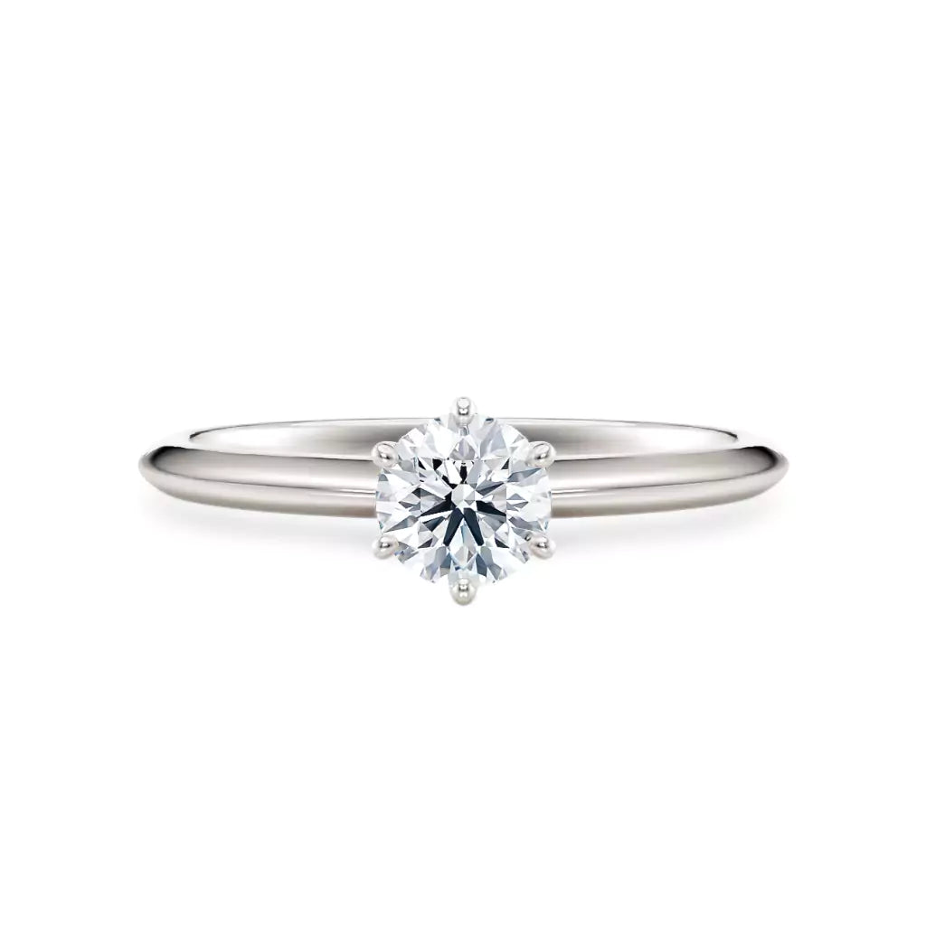 Diamantring i hvitt gull med 0,50 ct lab-diamant i knife edge design, vist liggende forfra, designet av Hartwell.