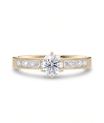 Diamantring kanalinnfatning gult gull med 0,74 ct med lab-diamant, vist liggende forfra, designet av Hartwell.