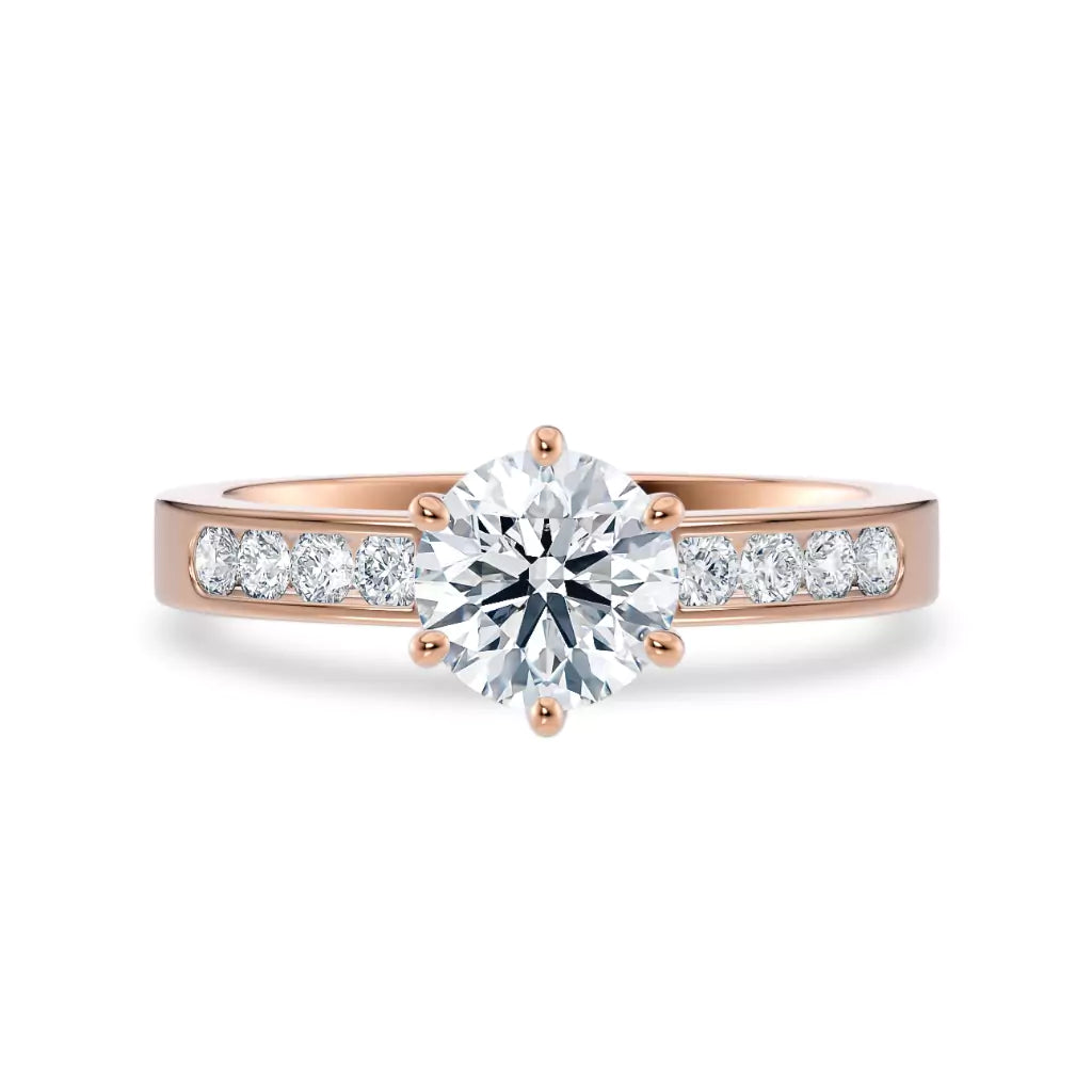 Diamantring kanalinnfatning i roségull med 1,29 ct med lab-diamant, vist liggende forfra, designet av Hartwell.