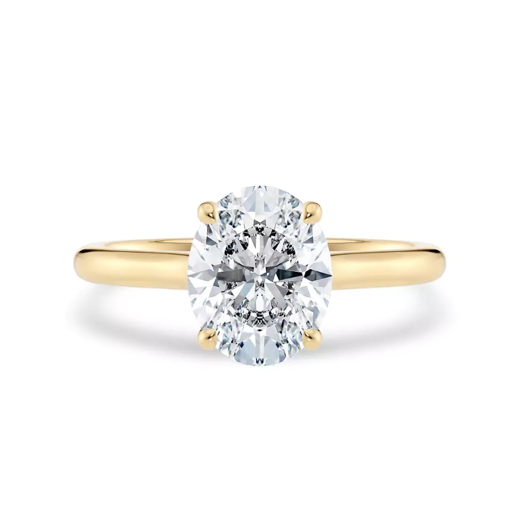 Diamantring oval gult gull 2 ct lab diamant, vist liggende forfra, designet av Hartwell.