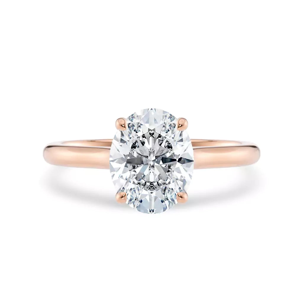 Diamantring oval roségull 2 ct lab diamant, vist liggende forfra, designet av Hartwell.
