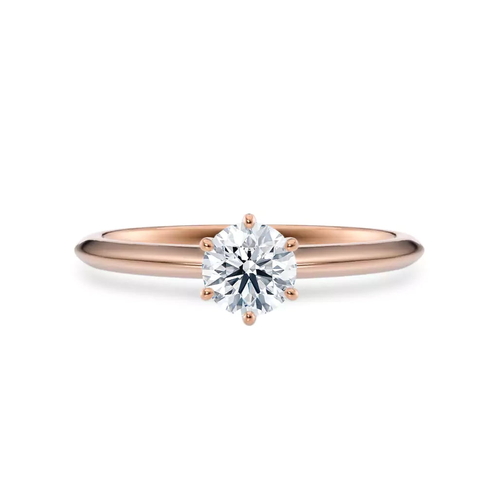 Diamantring i roségull med 0,50 ct lab-diamant i knife edge design, vist liggende forfra, designet av Hartwell.