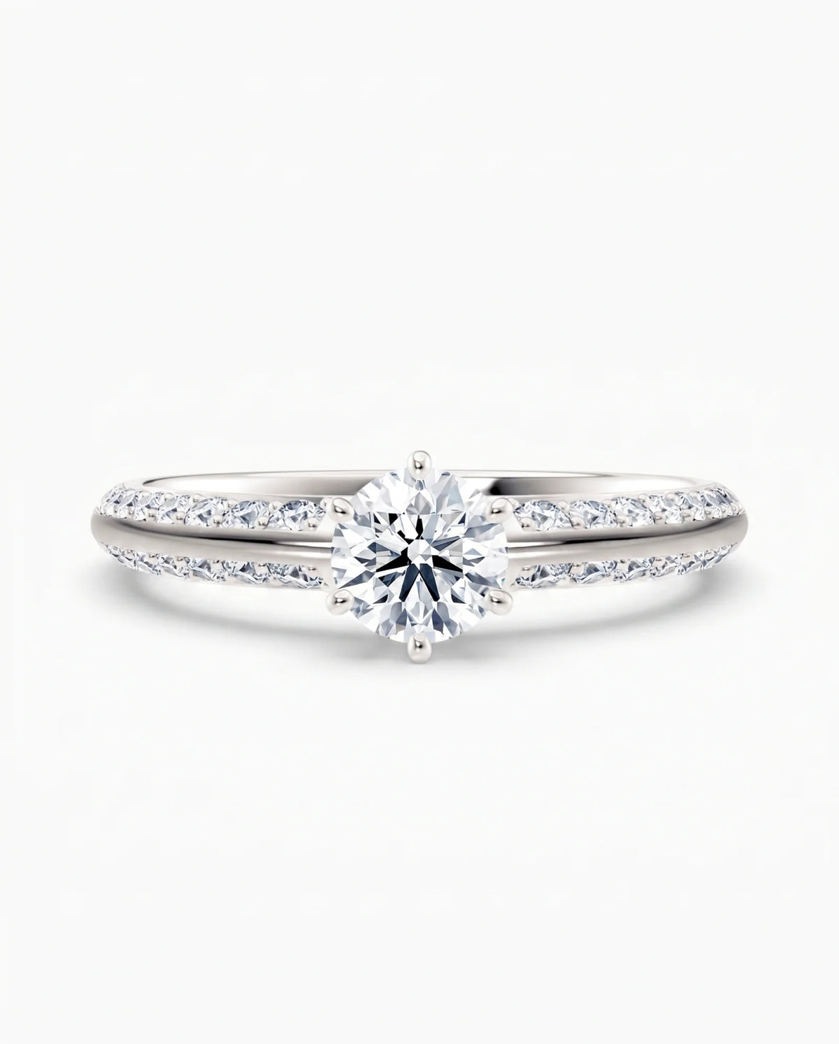 Diamantring tapered pavé hvitt gull med 0,90 ct med lab-diamant, vist liggende forfra, designet av Hartwell.