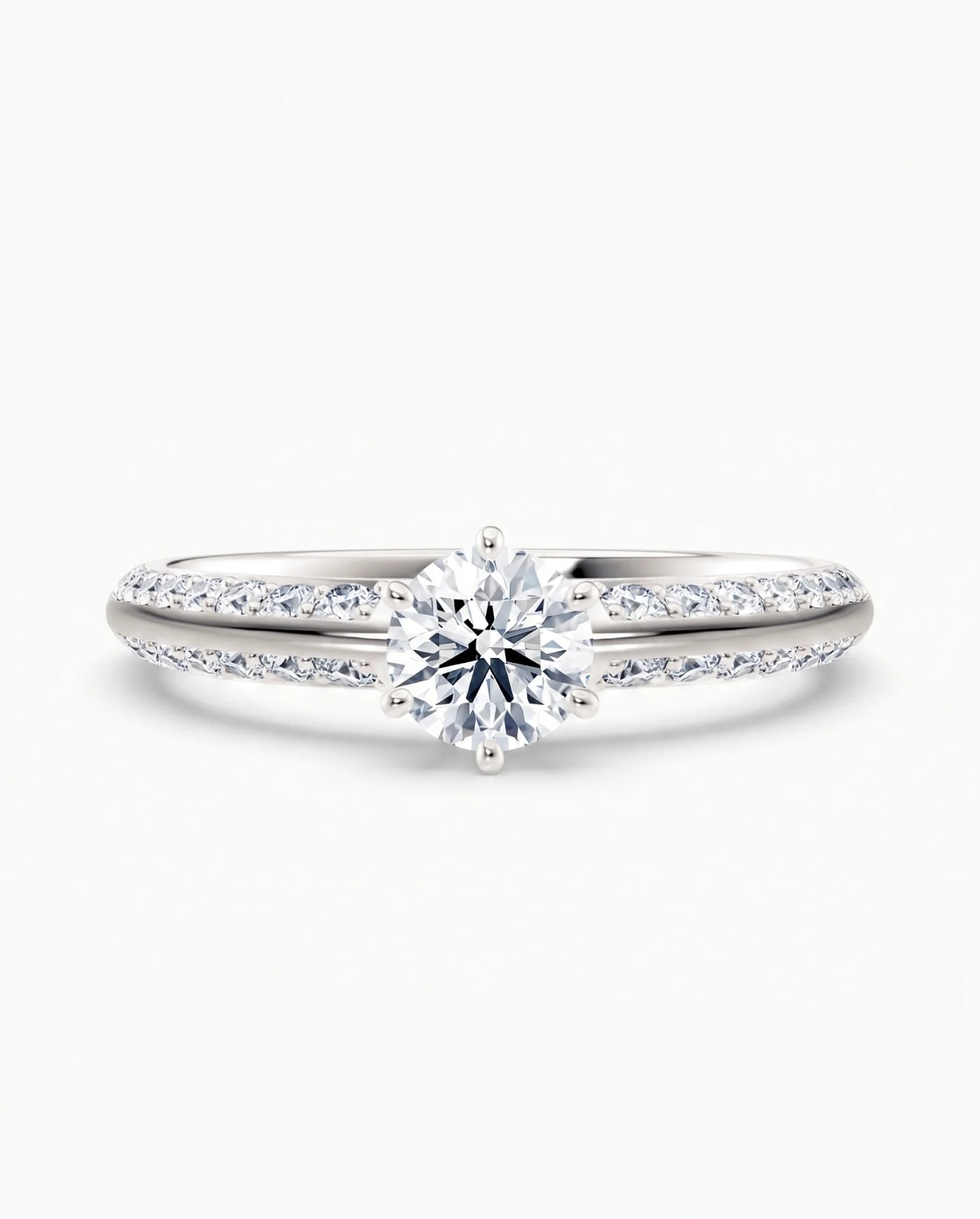 Diamantring tapered pavé hvitt gull med 0,90 ct med lab-diamant, vist liggende forfra, designet av Hartwell.