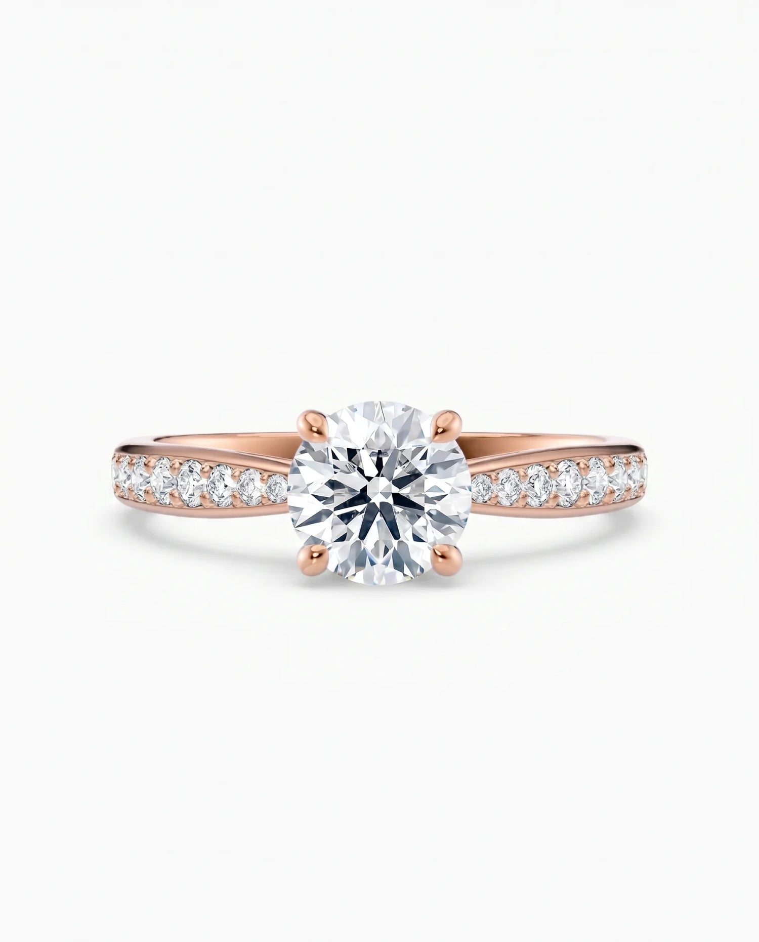 Diamantring tapered pavé roségull med 1,27 ct med lab-diamant, vist liggende forfra, designet av Hartwell.