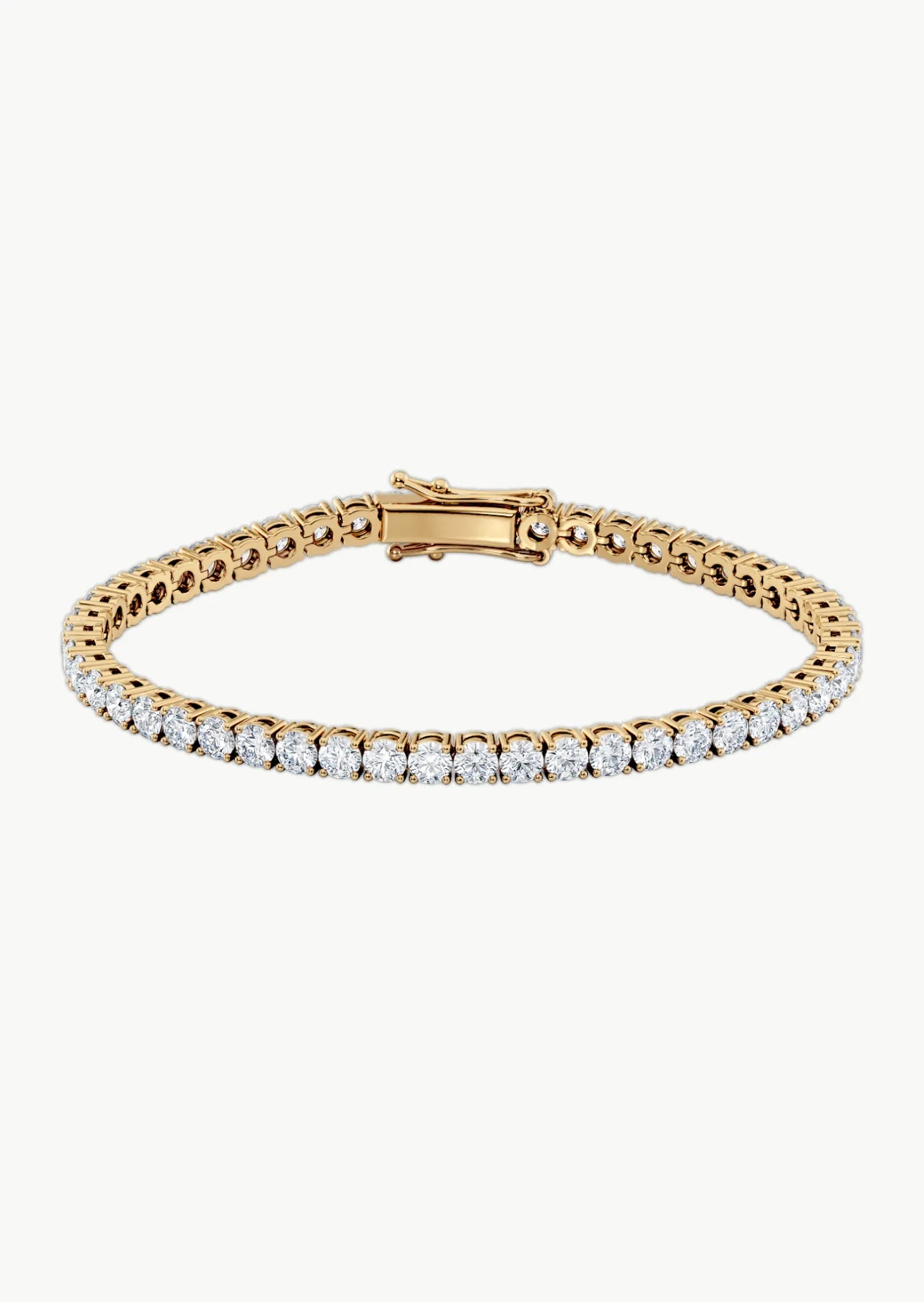 Tennisarmbånd med 8 carat lab diamanter i gult gull fra Hartwell 
