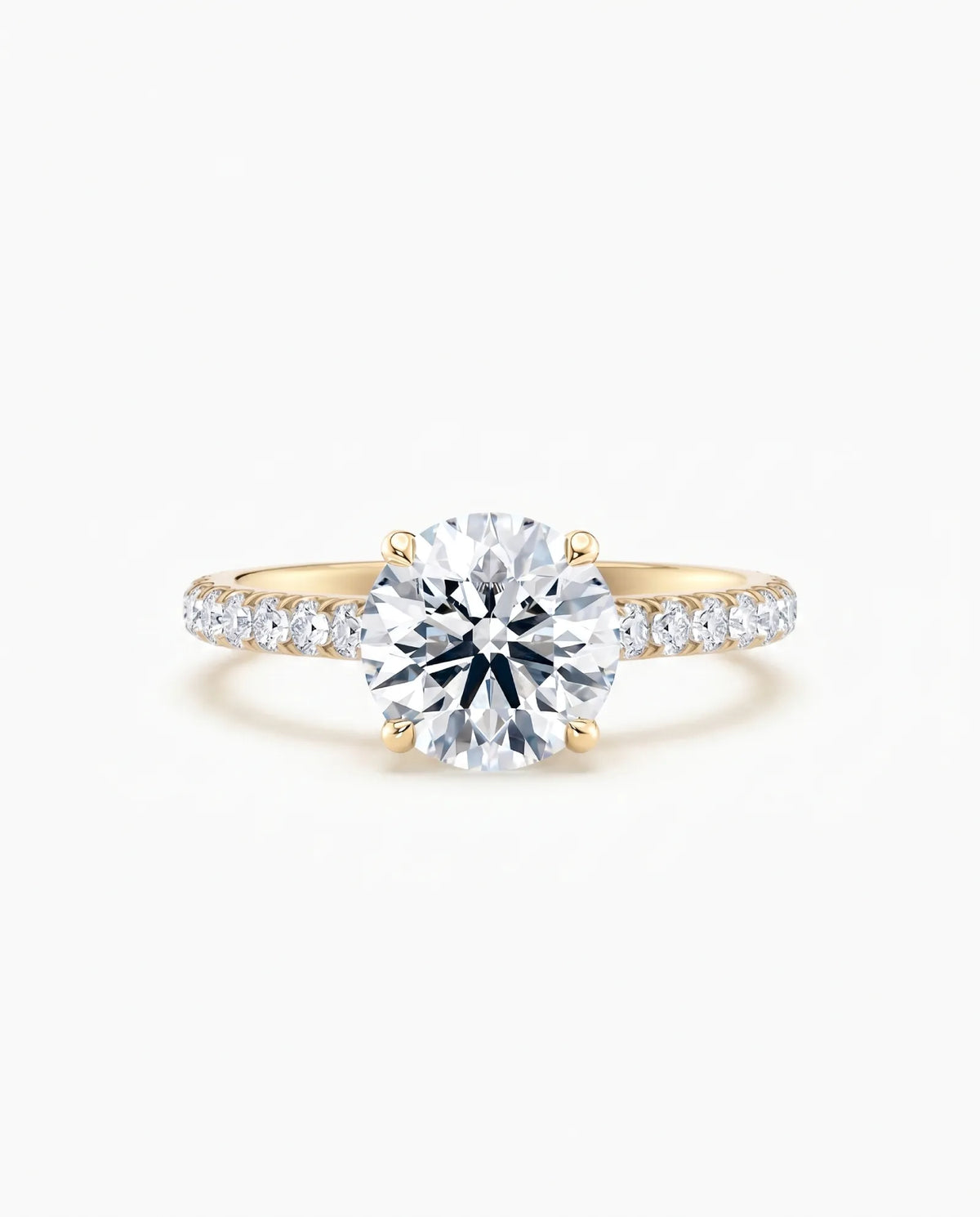 Tynn diamantring pavé gult gull 2,35 ct med lab-diamant, vist liggende forfra, designet av Hartwell.