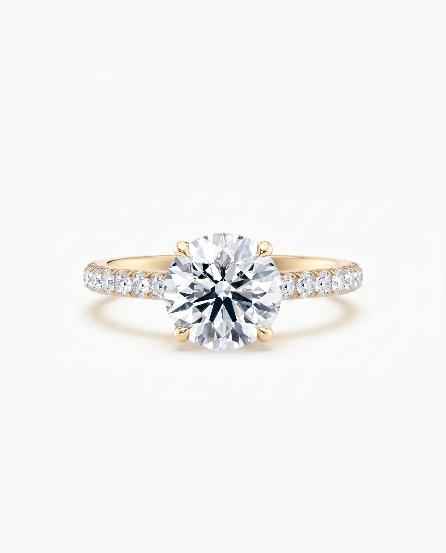 Tynn diamantring pavé gult gull 2,35 ct med lab-diamant, vist liggende forfra, designet av Hartwell.