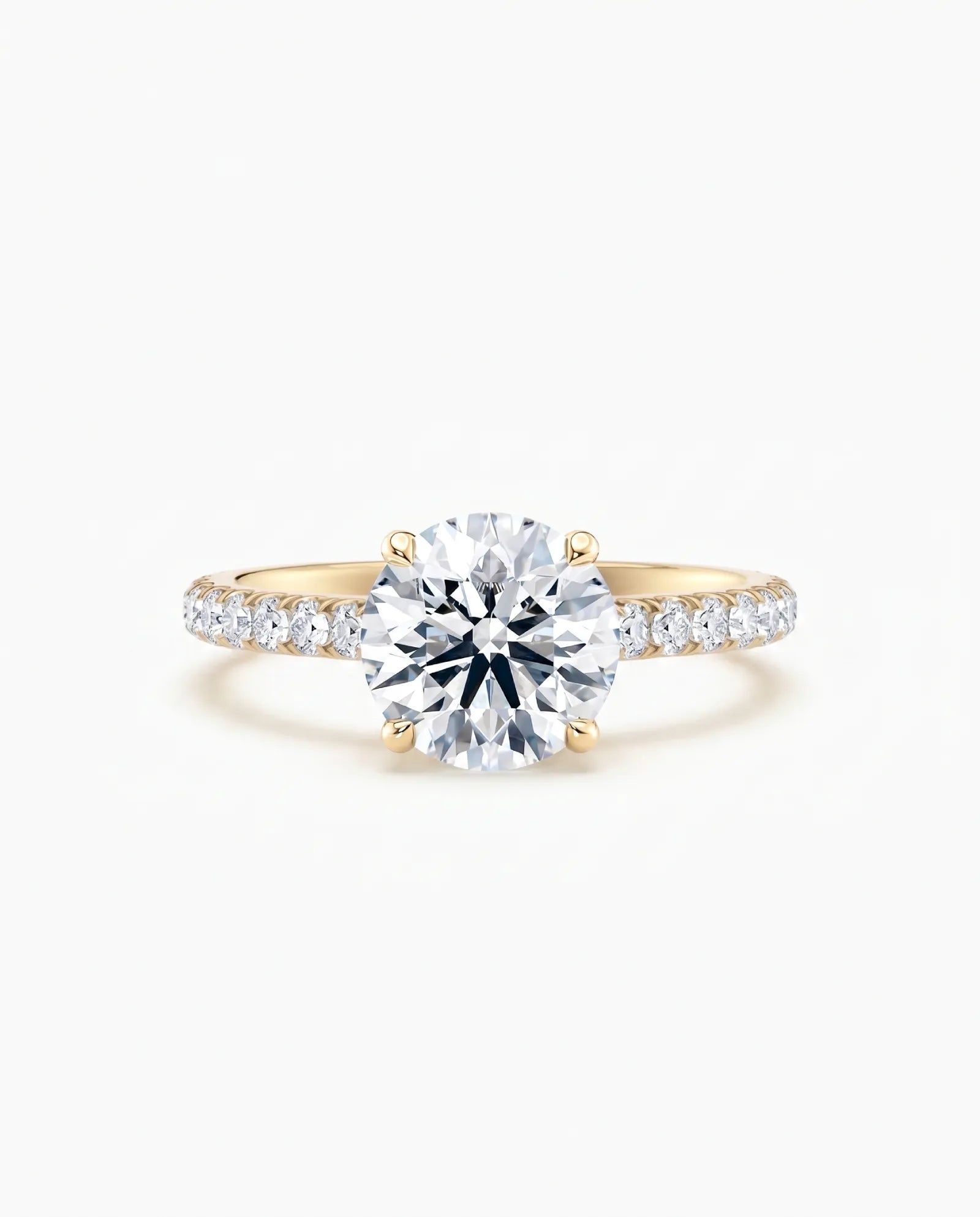 Tynn diamantring pavé gult gull 2,35 ct med lab-diamant, vist liggende forfra, designet av Hartwell.